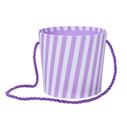 Picture of 14cm ROUND CARDBOARD FLORAL POT WITH ROPE HANDLE - STRIPED LILAC/WHITE